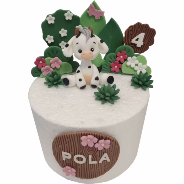 Zestaw dekoracji na tort Krówka – uroczy topper z krówką, kwiatami i zielonymi liśćmi, idealny na urodziny i przyjęcia dla dzieci.
